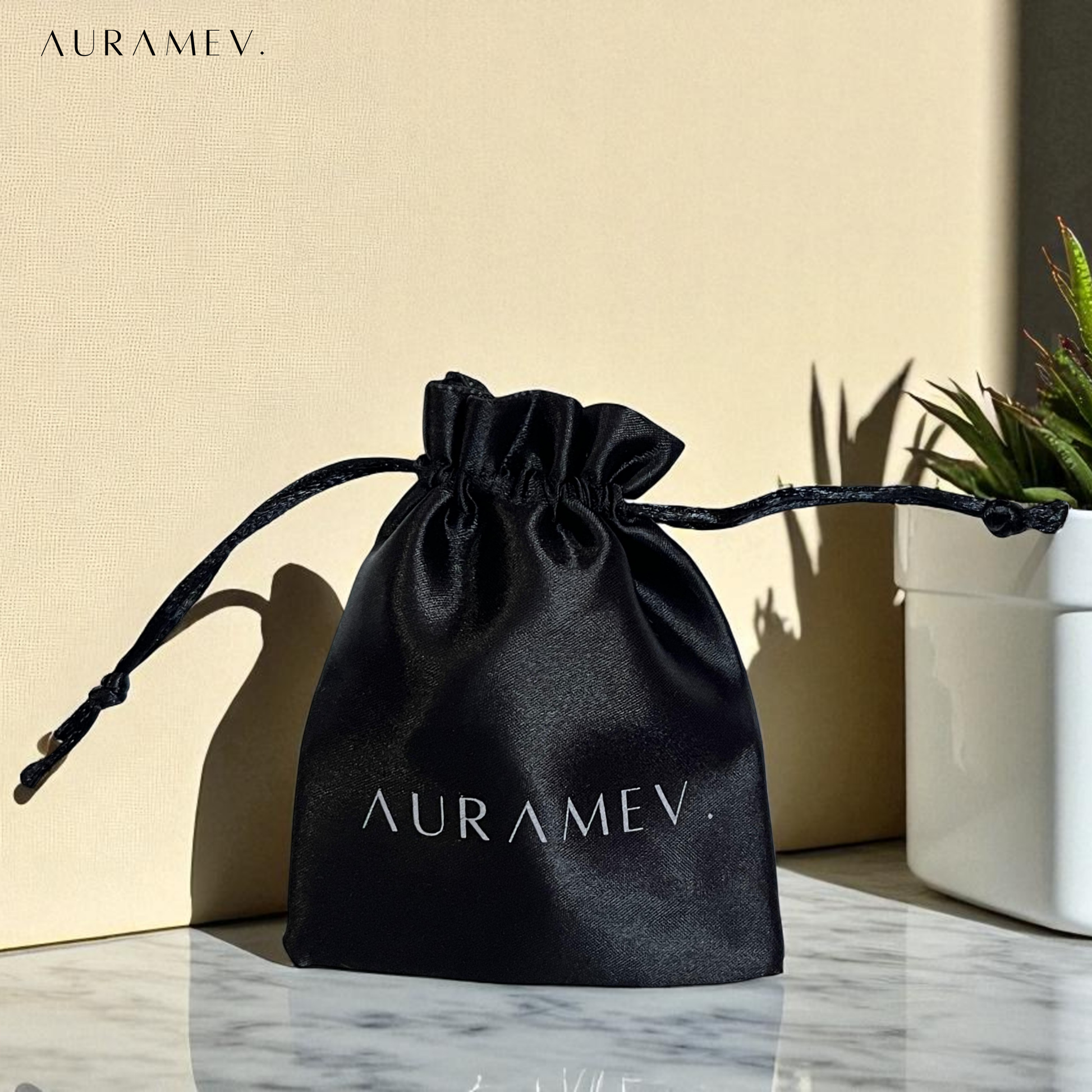 Auramev's handcrafted premium satin jewellery pouch with drawstring closure, ideal for gifting and safe storage.