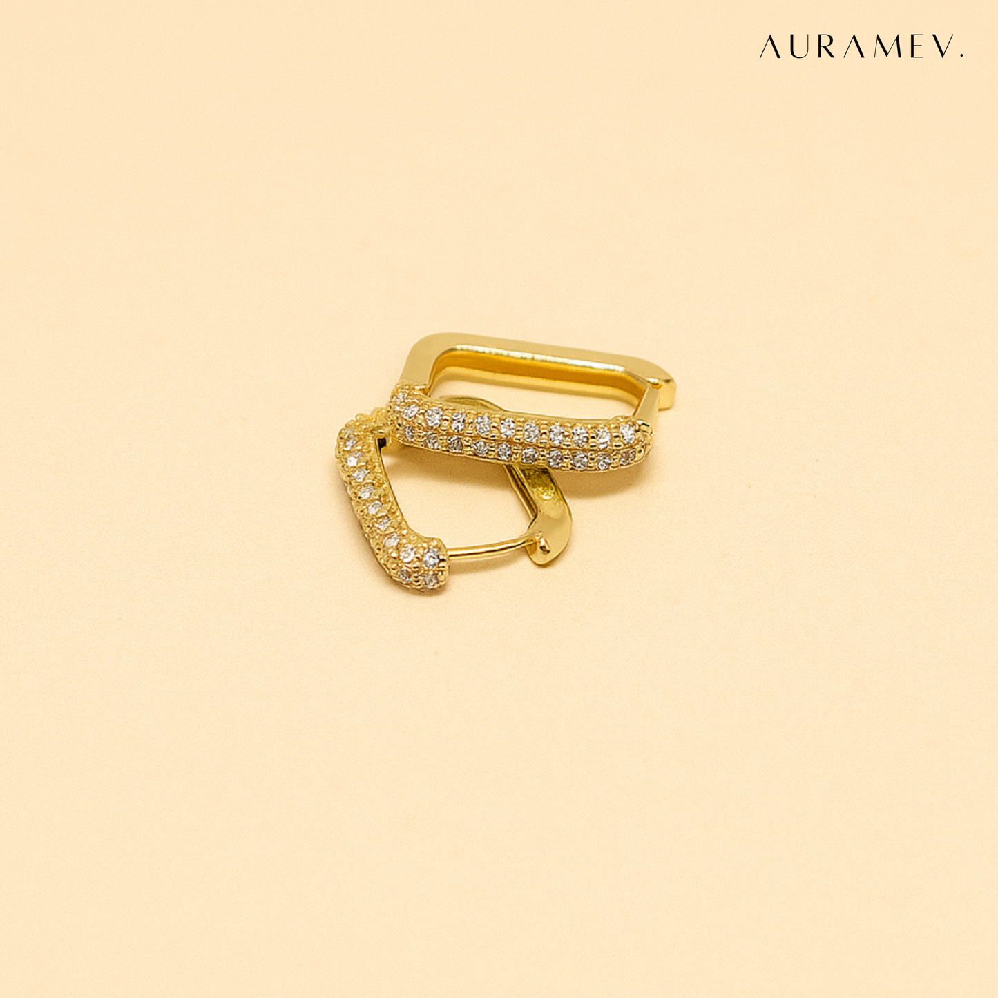 Gold rectangle huggie earrings with sleek 18K PVD gold plating and modern shine