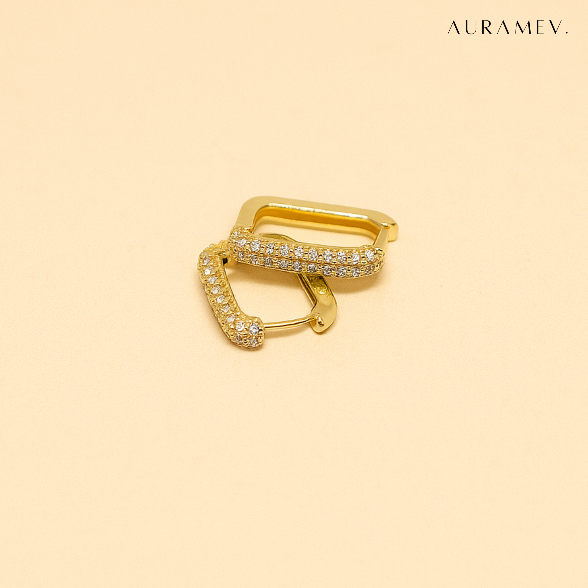 Gold rectangle huggie earrings with sleek 18K PVD gold plating and modern shine