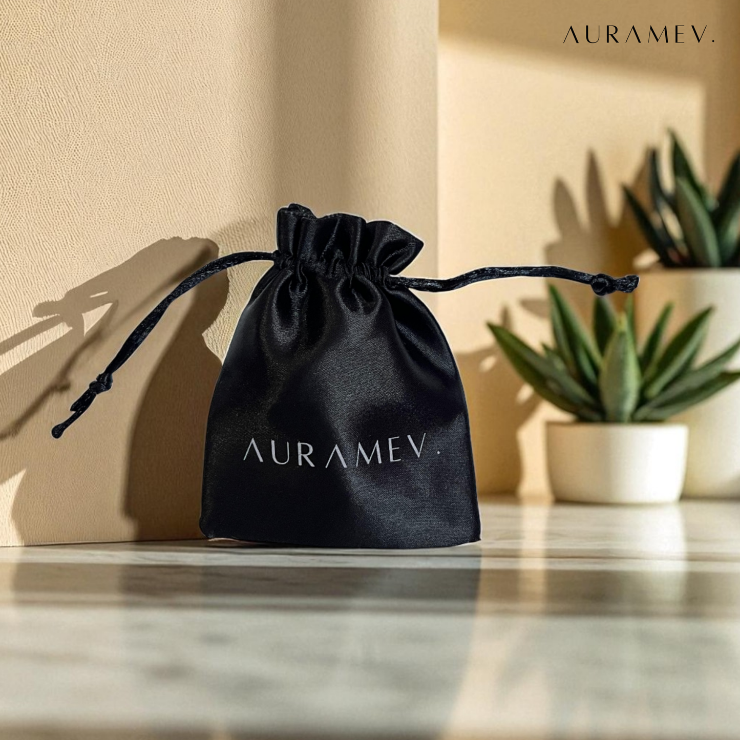 Auramev's premium satin jewellery pouch with drawstring closure, ideal for gifting and safe storage