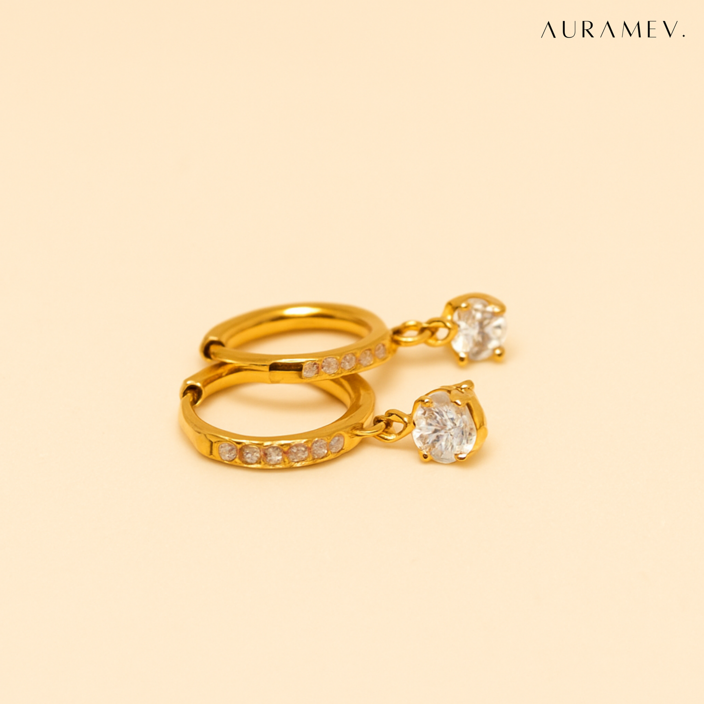 Solitaire Drop Gold Huggie Earrings: 18K gold plated anti-tarnish hoops with dangling clear crystal stone, perfect for everyday wear and minimal styling.